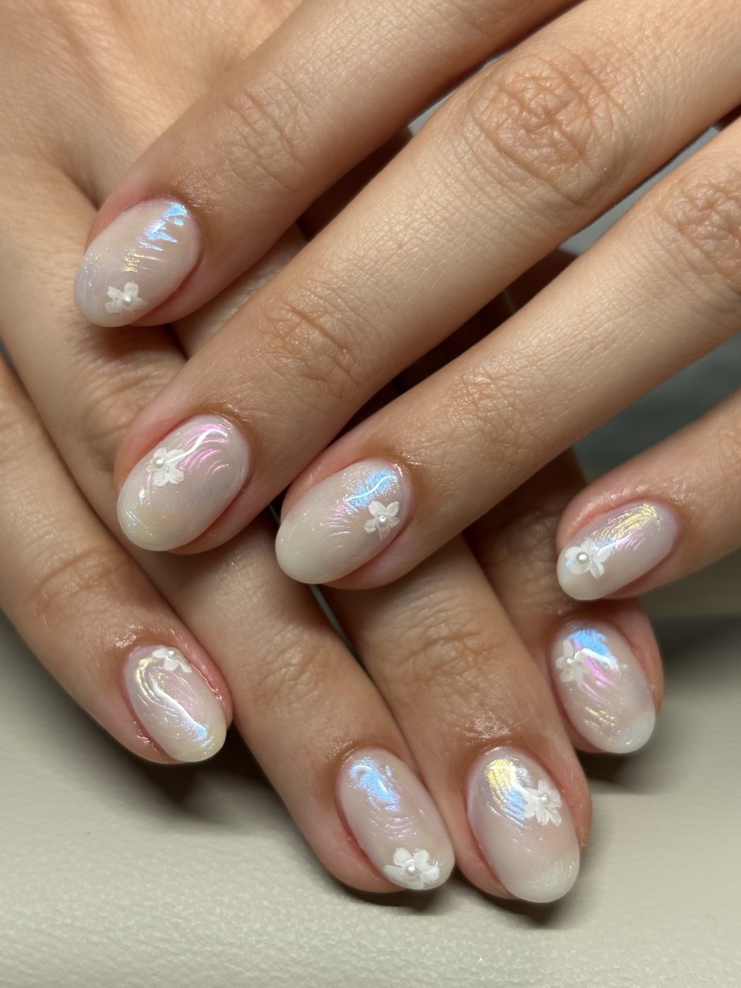 Iridescent Pearl with White 3D Blossoms | Delicate Nail Art in Tokyo