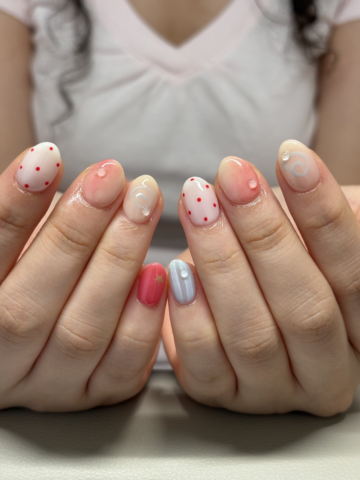 Red Dots and Clear Droplets on Soft Pastels | Playful Short Nails in Tokyo