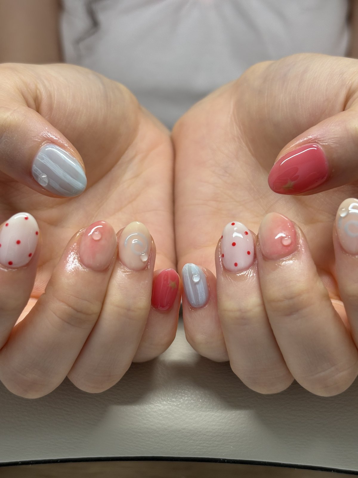 Red Dots and Clear Droplets on Soft Pastels - nail design by lull., Harajuku Tokyo