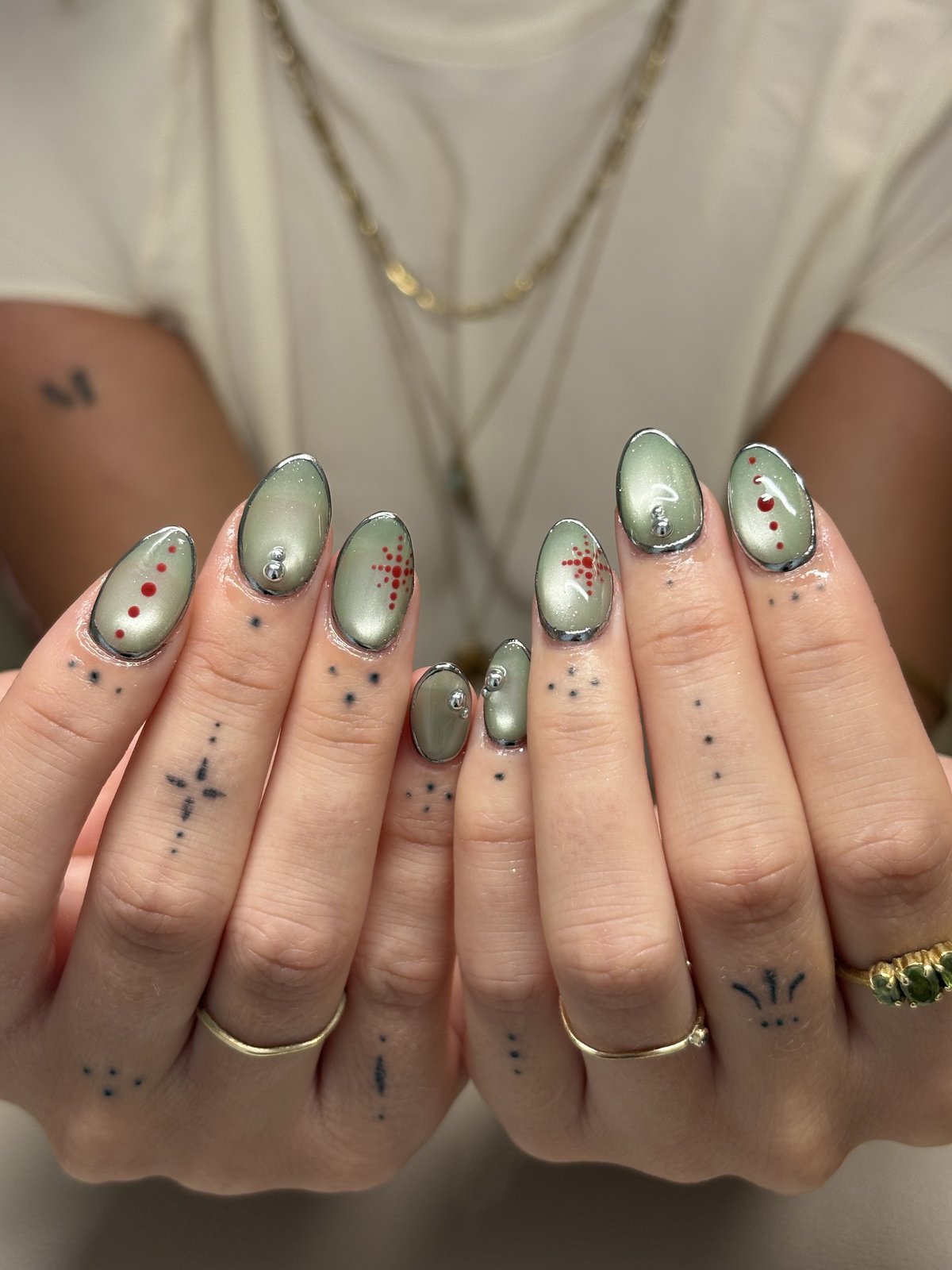 Sage Green Chrome with Red Dot Constellations | Graphic Nails in Harajuku