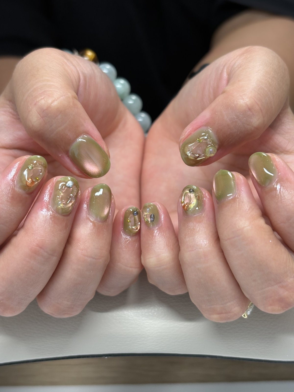 Olive Chrome with Amber Stones - nail design by lull., Harajuku Tokyo