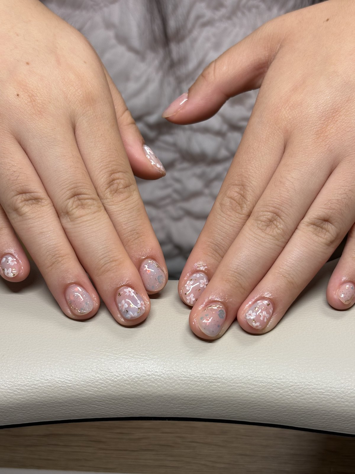 White Blossoms on Grey-Blue with Gold Foil - nail design by lull., Harajuku Tokyo