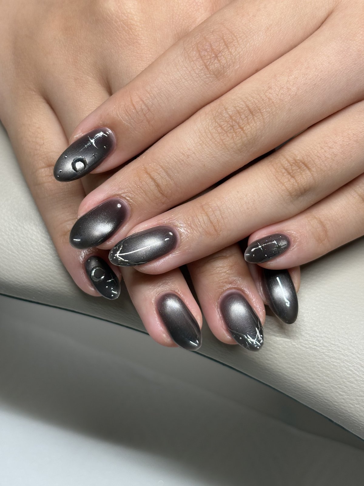 Espresso Brown Cat Eye with Silver Charms - nail design by lull., Harajuku Tokyo