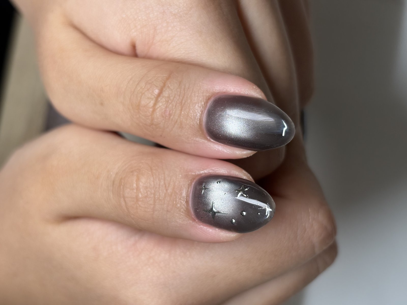 Espresso Brown Cat Eye with Silver Charms - nail design by lull., Harajuku Tokyo