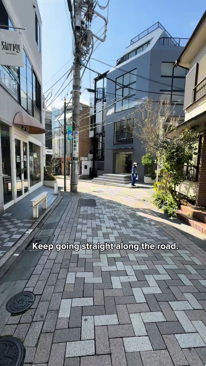 Street that continues straight toward Eyes Building